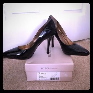 Sexy never worn black patent stiletto pumps